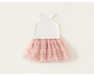 Detail of white sleeveless top with lace trim and pink layered mesh tutu skirt