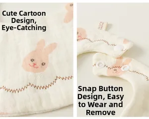 Close-up of cotton baby bib featuring pink rabbit prints and snap button design