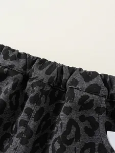 Kids leopard print casual trousers with comfortable elastic waistband in grey knit fabric