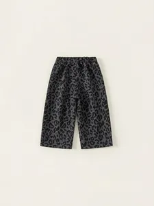 Kids wide-leg leisure trousers featuring a grey leopard print with an elastic waist