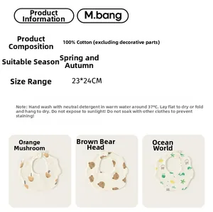 Detailed size chart for 100% cotton baby bibs featuring mushroom and bear prints