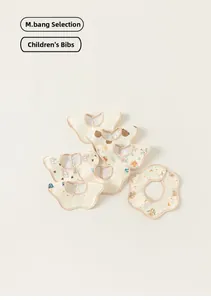 Detailed flat lay of seven cotton baby bibs with cartoon bears and floral prints