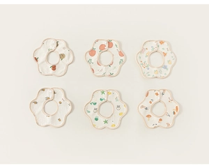 Detail view of 6-piece waterproof cotton baby bib set with colorful hand-painted patterns