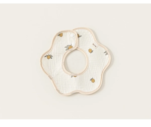 Close-up of petal-shaped cotton baby bib with lemon pattern and resin snap buttons