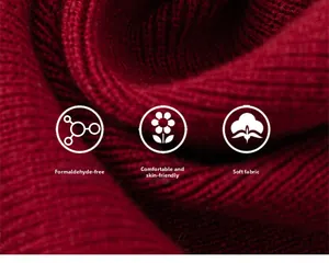Close-up of red ribbed knit shawl showing soft texture and formaldehyde-free fabric
