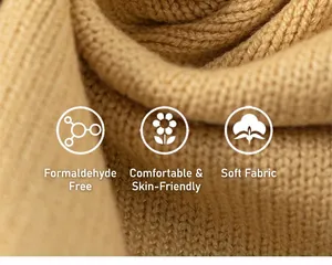 Macro dettaglio del tessuto a maglia color cammello, delicato sulla pelle e certificato
