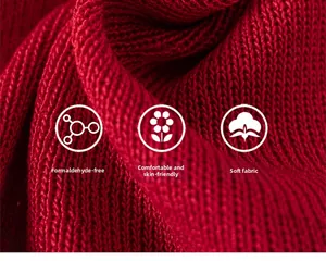 Detail of soft skin-friendly knitted fabric in deep red for kids knitwear