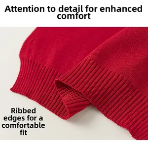 Macro shot of high-quality red knit fabric showing detailed ribbed edging and fine texture