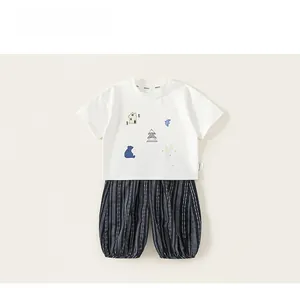 Detail of kids summer cotton set featuring white bear tee and navy striped lantern pants