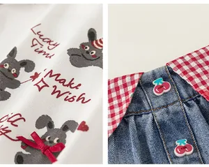 Detail of cartoon rabbit print, cherry decorative buttons, and red plaid denim stitching