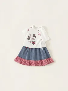 Girls summer two-piece outfit featuring bunny graphic white t-shirt and plaid denim skirt