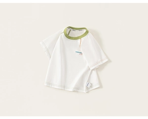 Detail of children's cotton T-shirt featuring contrast stitching and ribbed collar details