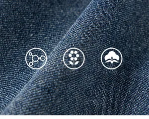 Close-up of soft navy denim fabric texture with breathable twill weave and cotton fibers