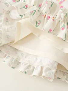 Jupe d'été à fleurs pour fille avec bord volanté et doublure douce en tons crème
