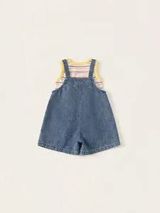 Girls' summer outfit featuring a striped tank top and denim overall shorts on beige background
