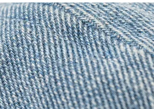 Detailed macro view of soft blue twill knit fabric texture for children beret hats