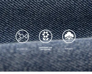 Détail du tissu denim bleu foncé doux montrant la texture sergé de coton et la qualité douce