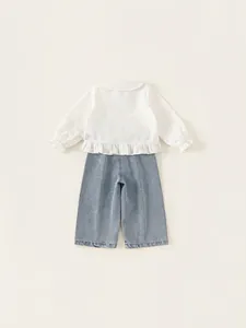 Set bambina con top bianco a pois con volant e pantaloni in denim a gamba larga