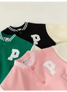 Detailed close-up of kids' baseball jackets with letter P embroidery and ribbed collar
