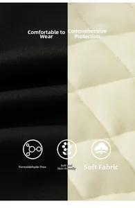 Detail of cream diamond-quilted fleece and black fabric with formal-free safety label
