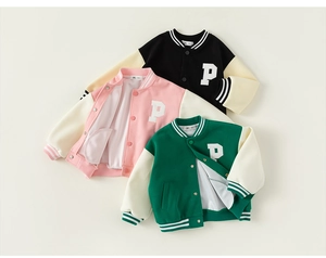 Detail of children's baseball jackets with letter P patch and contrast striped ribbing