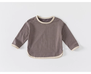 Close-up of kids striped long sleeve T-shirt with ribbed cuffs and curved hem details