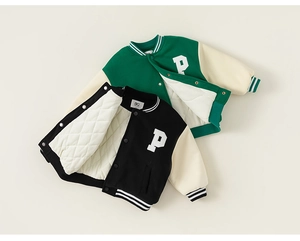Detail view of kids colorblock baseball jacket featuring quilted lining and P letter patch