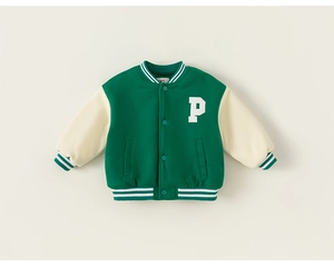Detail of kids varsity jacket featuring a green body, white sleeves and striped ribbing