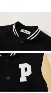 Detail of American retro baseball jacket with contrast sleeves and letter P embroidery