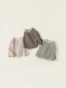 Kids long sleeve striped cotton t-shirts in beige brown and charcoal flat lay