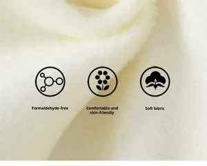 Close-up of soft white faux fur fabric with plush texture and skin-friendly comfort