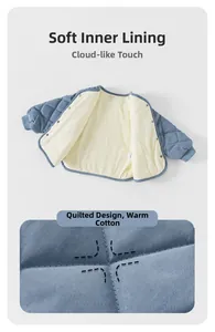 Close-up of diamond quilted pattern and warm fleece lining on toddler winter jacket