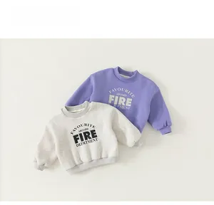 Close-up of purple and grey fleece sweatshirts featuring letter prints and ribbed cuffs