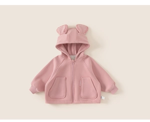 Detail of hooded kids jacket featuring 3D bear ears with embossed letters and soft pink fabric