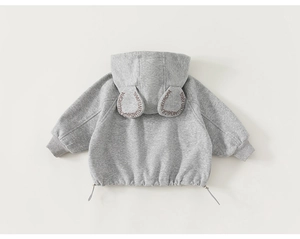 Detail view of children's grey hoodie with 3D bunny ears and drawstring hem