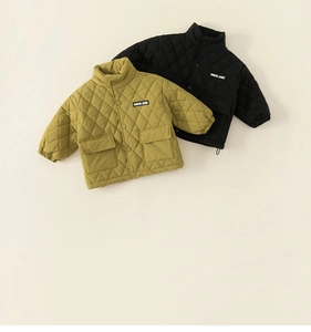 Close-up of diamond quilted kids jackets with stand collar and large flap pockets