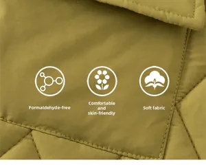 Detail of mustard yellow quilted fabric showing soft texture and skin-friendly quality