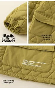 Detail view of quilted mustard jacket featuring elastic cuffs, flap pockets and letter prints