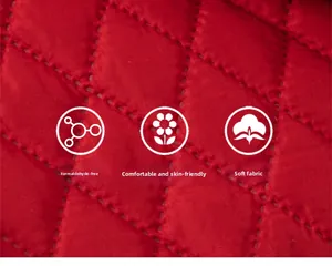 Détail du tissu matelassé rouge avec texture diamant douce et matériau sans formaldéhyde