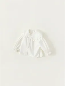 Girl's long-sleeve cream shirt with large ruffled lace collar and embroidered details