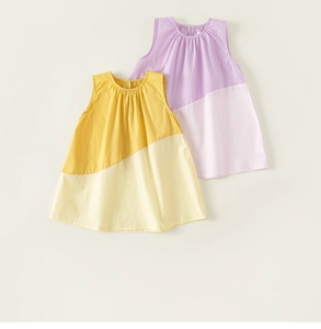 Detail of A-line sleeveless cotton dresses with diagonal color block and pleated neckline