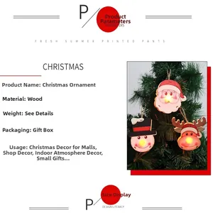 Detailed view of LED glowing wooden Christmas ornaments with Santa, snowman and elk shapes
