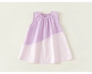 Detail of girls' sleeveless A-line dress featuring pastel patchwork and pleated neckline