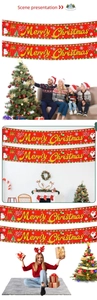 Close-up of red Merry Christmas banner with cartoon Santa and snowman holiday motifs