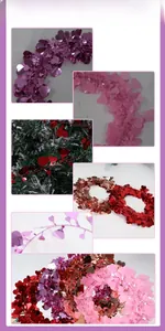Detail view of heart-shaped sequin tinsel garlands in red and pink for party decor
