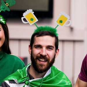 Saint Patrick's Day green plush headband with beer mugs and clover spring charms