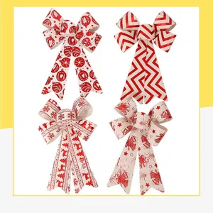 Detail showing four Christmas fabric bows with stripe, snowflake, and bell patterns