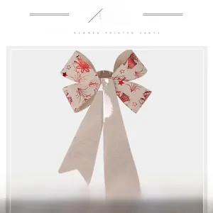 Detail of Christmas cotton bow showing the plastic back support for shape stability