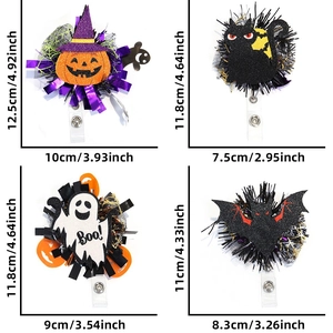 Detail view of retractable Halloween badge reels featuring sequined ghosts and pumpkins