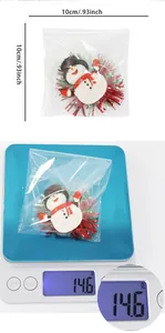 Détail montrant les dimensions et le poids du porte-badge bonhomme de neige de Noël